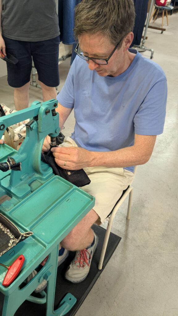 A hands-on denim rivet workshop at Betty Smith in Kojima, Okayama.
